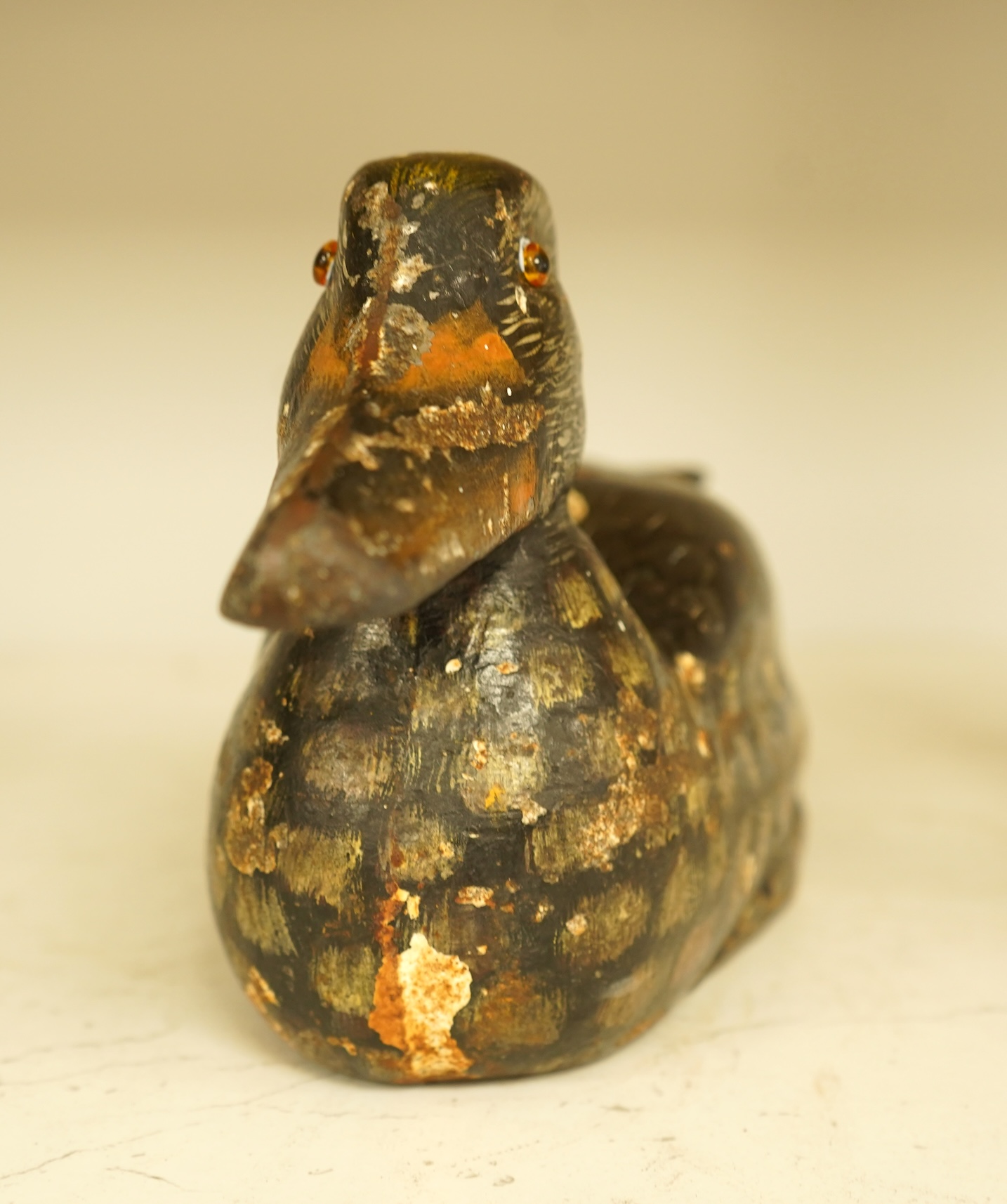 A novelty cast iron doorstop in the form of a duck, 32cm wide